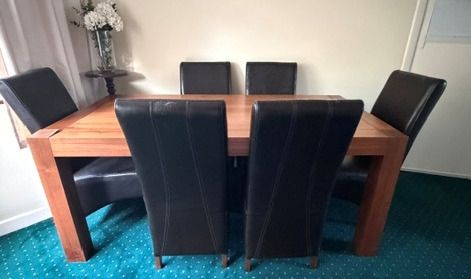 Solid Oak dining table with 6 high back chairs