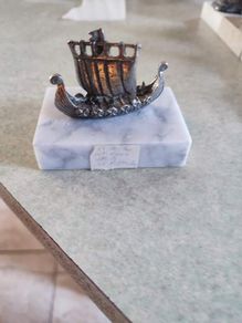 Vintage Norge pewter Viking ship figurine on marble plinth.