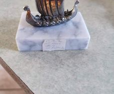 Vintage Norge pewter Viking ship figurine on marble plinth.