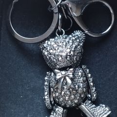A fashionable, luxurious teddy bear keychain with marcasites.