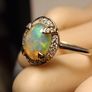Ethiopian Welo Opal and Lab Grown Diamond Oval Cluster Ring. Image 7