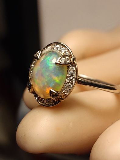 Ethiopian Welo Opal and Lab Grown Diamond Oval Cluster Ring.