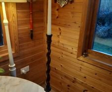 Antique oak barley twist candlestick w/ candle. D18