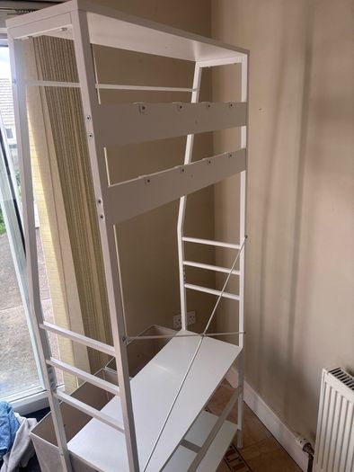 Tall white unit