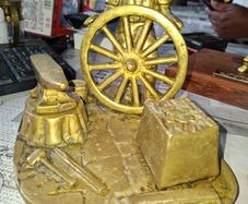Beautiful Rare Large Heavy Brass Blacksmith Figurine a Wheelwright Scene. It features a Blacksmith Mending a Large Wagon Wheel next to an Anvil, Tools, and a Block, Postage Available,