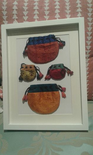 Beautiful framed silk bags from Nepal .