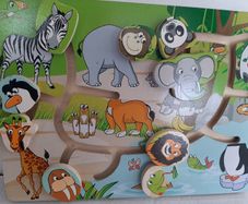 wooden jigsaw animals slide on board