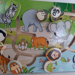 wooden jigsaw animals slide on board
