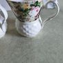 Set of 2 mugs decorative porcelain  fine bone china featuring a distinct textured, quilted or honeycomb base and intricate floral patterns. Image 8