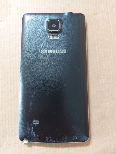 Samsung Galaxy Note 4, Model SM-N910F, in excellent cosmetic condition, not powering on, Battery looks a little swollen, so may need new battery