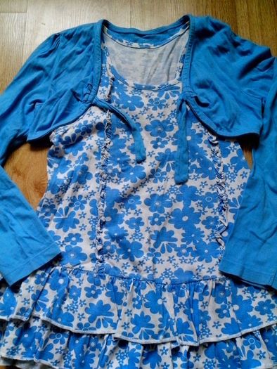 White dress with blue flowers.  Age 8-9