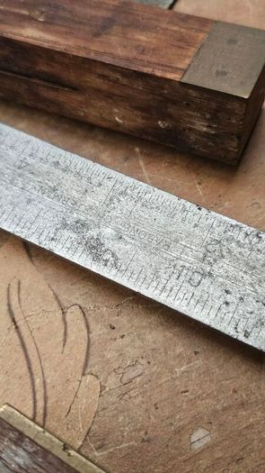 Squares, sliding bevel and ruler