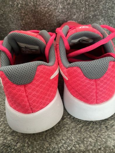 Pink Nike Tanjun runners