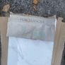 Bag of grey grout and some wall tiles Image 6