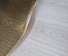fab gold hammered metal coffee table..small dent hence cheap price