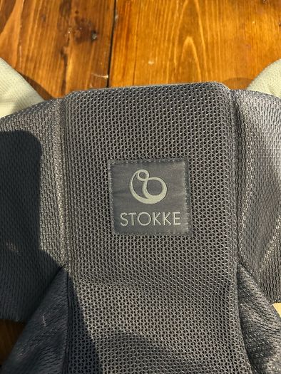 Baby and toddler sling / carrier. Stokke MyCarrier Front and back carrier