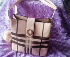 Baby pink handbag