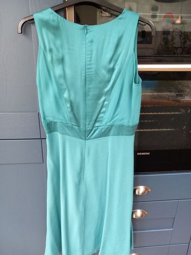 Turquoise knee length silk dress