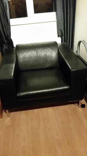Large black leather armchair in perfect condition. Used only in bedroom.