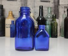 393 - Set of Two Beautiful Vintage Cobalt Blue Glass Decorative Collectible Milk of Magnesia Bottles