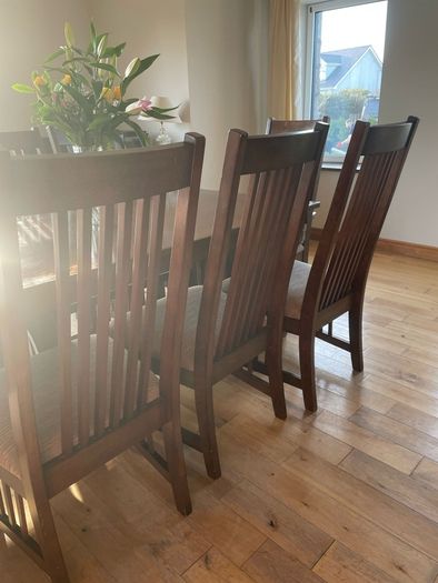 Beautiful long dark Oak Dining table and 8 chairs