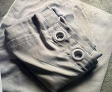 Pair of soft grey blackout and sound deadening curtains