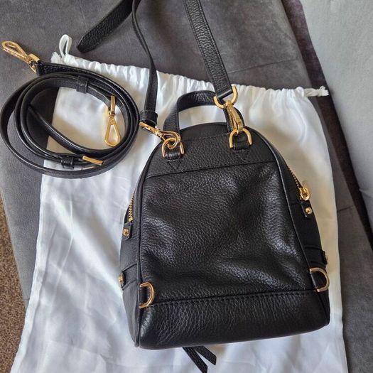 Genuine Michael Kors black mini backpack convertible crossbody in excellent condition