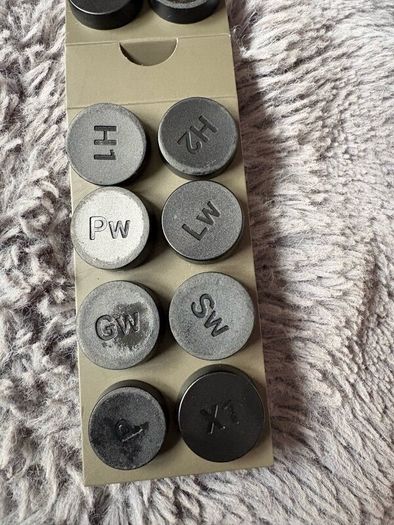 Golf watch with tags and spare tags
