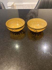 Pair of Minnie Peters polished stone and  gilt metal matching dishes