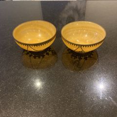 Pair of Minnie Peters polished stone and  gilt metal matching dishes