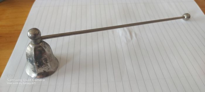 Candle metal snuffer ,,good patina for its age ,sold as seen