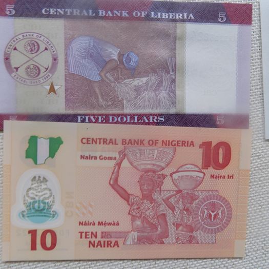 Lot of 8 World Banknotes.Uncirculated.No 9.Crisp,clean,bright.