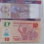 Lot of 8 World Banknotes.Uncirculated.No 9.Crisp,clean,bright. Image 6