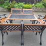 Cast iron table and chairs Image 2