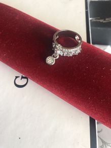 costume ring with dangely stone