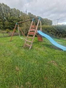 Swing set with slide