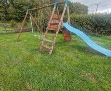 Swing set with slide