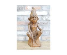 Rusty Cast Iron Elf Sitting D11217
