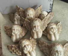 8 Cherub Angel Resting On Hands Wall Sculpture ,At 12.00 Euro EACH.