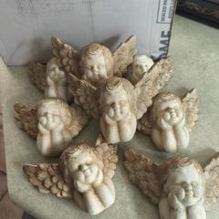 8 Cherub Angel Resting On Hands Wall Sculpture ,At 12.00 Euro EACH.