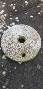 Antique Quern stone in Limestone