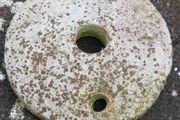 Antique Quern stone in Limestone