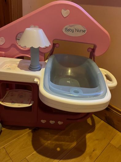 Baby doll play centre with high chair, bath and cot.