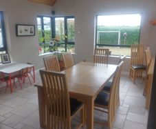 solid oak dining table and chairs