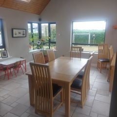 solid oak dining table and chairs