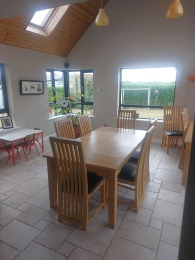 solid oak dining table and chairs