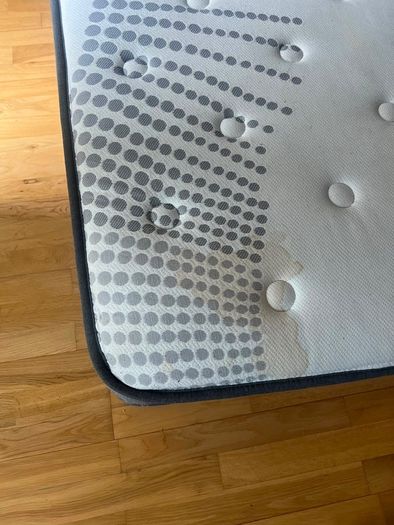 Mattress double supreme comfort with a small coffee stain