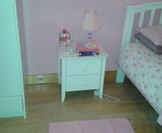 Single white wooden bed & bedside locker