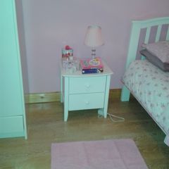 Single white wooden bed & bedside locker