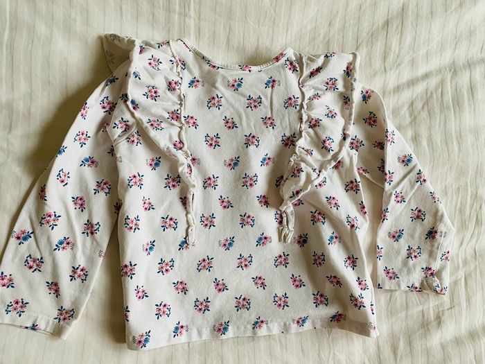 Floral top with ruffle details